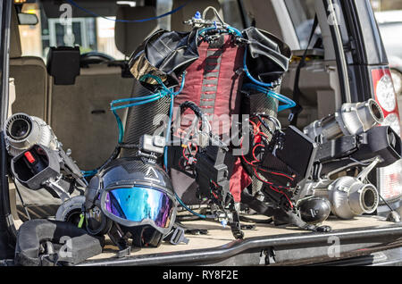 BASINGSTOKE, UK - MARCH 11, 2019: Jet pack and helmet produced by Gravity Industries. The jet engine produces enough power to allow the wearer to fly  Stock Photo