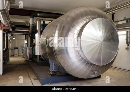 Silver machinery in factory Stock Photo