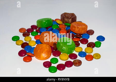 colorful coated chocolate candies on a white background. Stock Photo