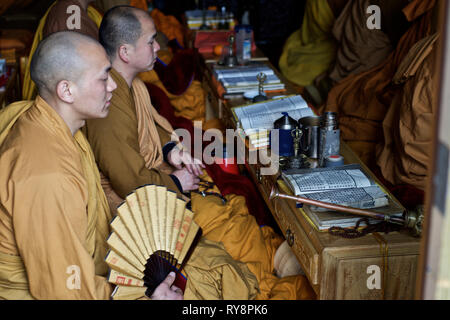 Buddhist having a collective lecture in temple, Wutai Shan, Shanxi, China Stock Photo