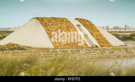 Bricks of dikes on the side of the field in Trapani Sicily in the saltmine  in Italy Stock Photo