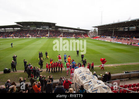 Players of Wrexham and Chesterfield entering field of play ,Vanarama League 1 game March 2 nd 2019 Stock Photo