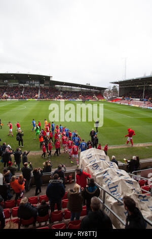 Players of Wrexham and Chesterfield entering field of play ,Vanarama League 1 game March 2 nd 2019 Stock Photo