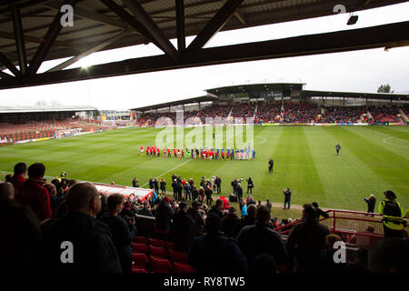 Players of Wrexham and Chesterfield entering field of play ,Vanarama League 1 game March 2 nd 2019 Stock Photo