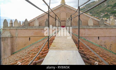 The alley on the roof of a church in Palermo Sicily Italy found in the center of the village with the roof shingles on it Stock Photo