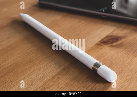 Apple Pencil 2015 1st generation for iPad Pro on wooden table Stock Photo