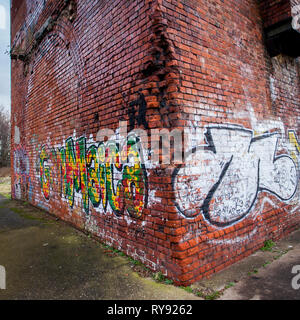 Graffiti on the wall of Barnsley main colliery. Stock Photo