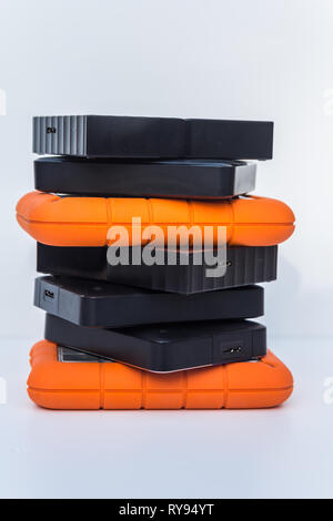 different kinds of external computer storage hard drives - isolated on white background Stock Photo