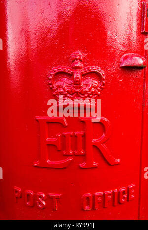 Close Up of a red cylindrical Letter Box on the High Street in Chipping Sodbury South Gloucestershire, South West England, Stock Photo