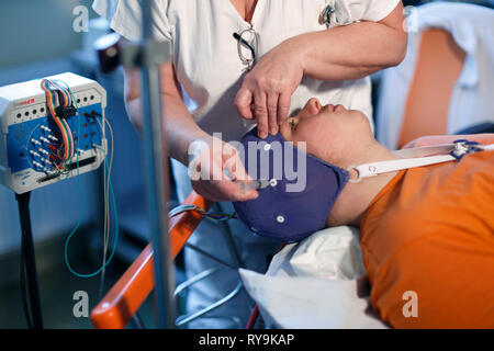 young man during electroencephalography examination Stock Photo