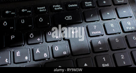 Laptop Keyboard, Black Keyboard. Keyboard Close Up with Sun Ray. Stock Photo