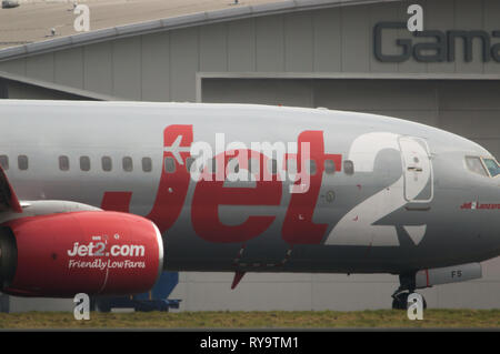 Glasgow, UK. 1 March 2019. Jet2 Holidays plane seen at Glasgow International Airport.  Jet2 Holidays is a low cost airline which regularly transports  Stock Photo