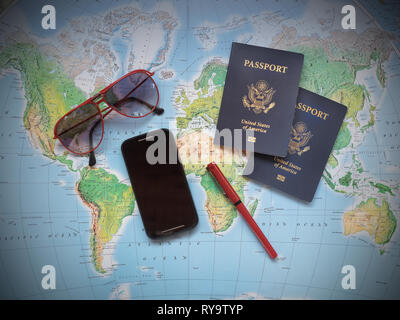 Passports on vacation travel map Stock Photo