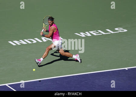 Indian Wells, California, USA. 12th Mar, 2019. Rafael Nadal of Spain, returns the ball to Diego Schwartzman of Argentina, during the men singles third round match of the BNP Paribas Open tennis tournament on Tuesday, March 12, 2019 in Indian Wells, California. Nadal won 2-0. Credit: Ringo Chiu/ZUMA Wire/Alamy Live News Stock Photo