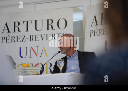 Madrid, Spain. 13th Mar, 2019. Arturo Pérez Reverte seen presenting his history book during a press conference.Four years of episode deliveries under the title ''Patente de corso'' have provided Arturo Pérez Reverte with the material for ''A History of Spain'', the compilation of his ''readings, experience and common sense'' about the memory of the country, '' from its origins to the end of the Transition' Credit: Jesus Hellin/SOPA Images/ZUMA Wire/Alamy Live News Stock Photo