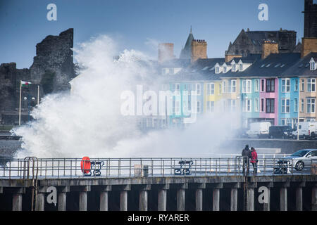 Aberystwyth, UK. 13th Mar, 2019. UK Weather: Gale force winds from Storm Gareth - the third named storm of 2019 - hit Aberystwyth on the Cardigan Bay coast, West Wales UK on Wednesday afternoon. Gusts of up to 70 or 80mph are forecast in exposed Northern regions, with the risk of serious damage to property and severe disruption to travel and power services Photo Credit: keith morris/Alamy Live News Stock Photo