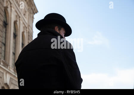 Vienna, Austria - November 2, 2015: Coachman in black hat drives the cart, Vienna Stock Photo