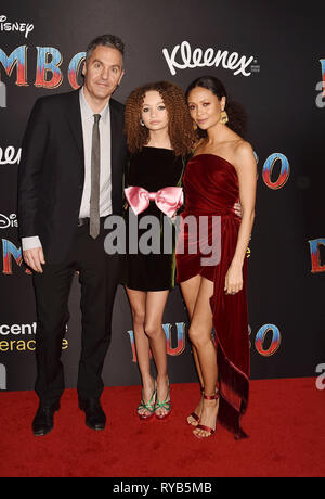 HOLLYWOOD, CA - MARCH 11: (L-R) Ol Parker, Nico Parker and Thandie Newton attend the premiere of Disney's 'Dumbo' at El Capitan Theatre on March 11, 2019 in Los Angeles, California. Stock Photo