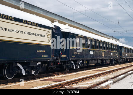 Ruse city, Bulgaria - August 29, 2017. The legendary Venice Simplon Orient Express is ready to depart from Ruse Railway station. Sleeper. The luxury t Stock Photo