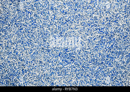 Plastic blue and white granulated crumb at the plant for processing and casting products from domestic and industrial waste Stock Photo