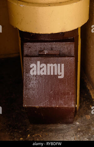 Old garbage chute in apartment building with cheap apartments - Rubbish chute in a Soviet block of flats Stock Photo