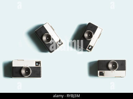Vintage cameras on gray background Stock Photo