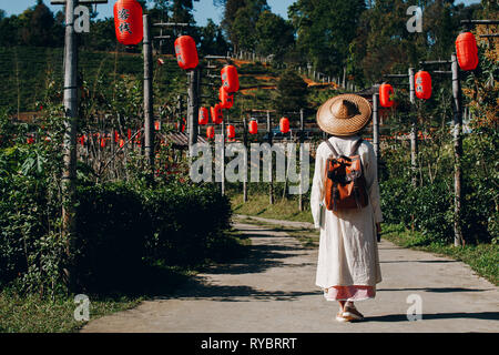 Female tourists spread their arms and held their wings, smiling happily. Stock Photo