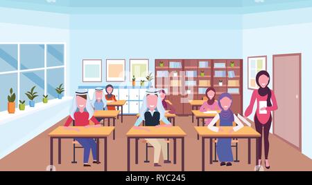 muslim teacher reading book during lesson arabic pupils in hijab sitting desks education concept modern school classroom interior horizontal full Stock Vector