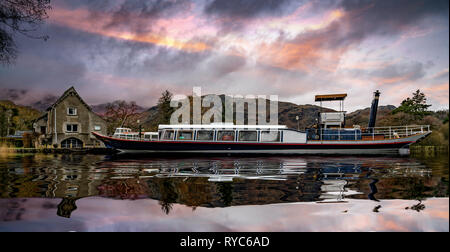 The Steam Yacht 'Gondola' at Pier Cottage, Coniston Water, Cumbria, United Kingdom. Stock Photo