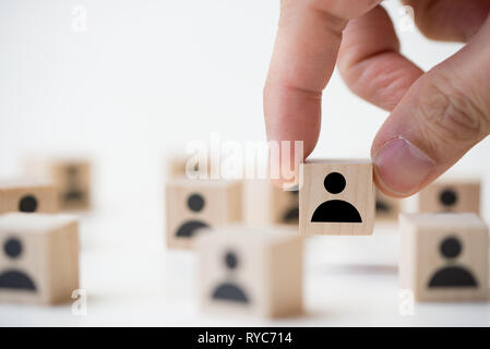 Job recruitment concept using icon people wood cube block Stock Photo