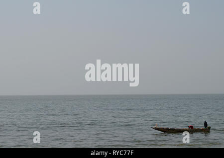 Artisanal pirogues at the beach of Djiffère, Senegal Stock Photo