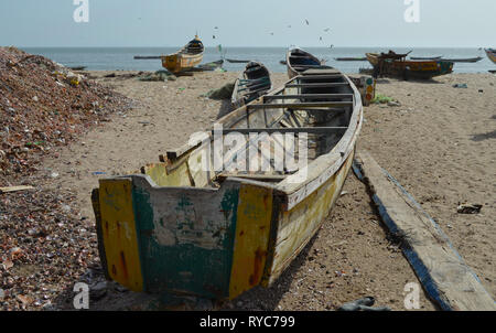 Artisanal pirogues at the beach of Djiffère, Senegal Stock Photo