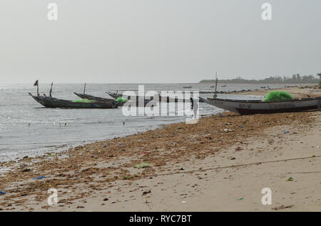 Artisanal pirogues at the beach of Djiffère, Senegal Stock Photo