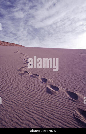 Footprints in a sand dune in the desert at Valle de la Muerte, Spanish for Death Valley, Atacama desert, Chile, South America Stock Photo