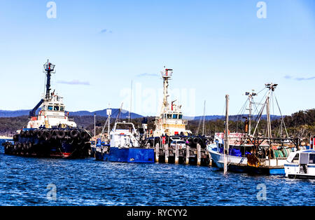 Fishing boats moored at Eden Harbour on New South Wales south coast Stock Photo