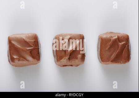 Chocolate bars above top view isolated on white background Stock Photo