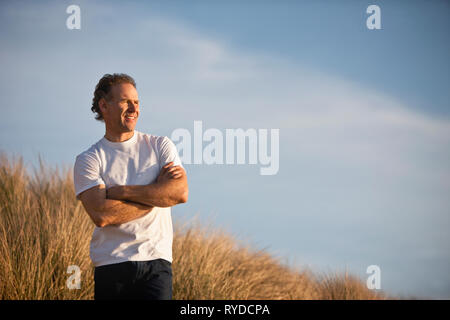 Mature man looking into the distance. Stock Photo
