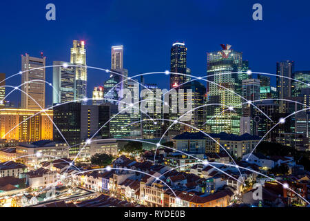 Singapore downtown financial center skyline with high speed networking connection showing business high tech concept. Stock Photo