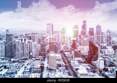 Modern Seattle urban skyline with high-speed data and internet communication network. Concept of cyber network in big city with copy space. Stock Photo