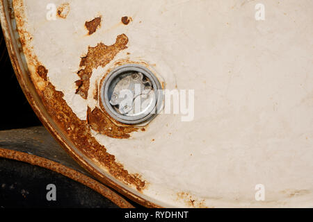 Rusty white metal barrel background. Old barrel with grunge texture. Dirty background of cracked paint. - Image Stock Photo