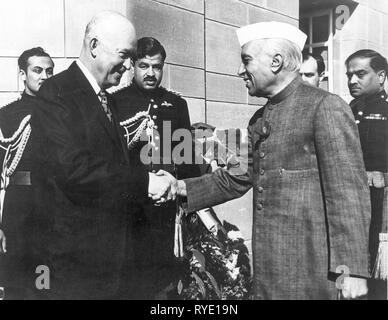 Prime Minister Jawaharlal Nehru receiving U.S. President Dwight D. Eisenhower at Parliament House, before the President addressed a joint session of Indian Parliament. Stock Photo