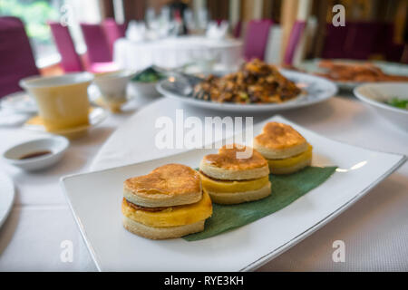 Heart shaped dessert pastries on plate at CHIOU-HWA restaurant - Taipei, Taiwan Stock Photo