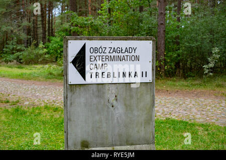 Sign at the entrance of the Treblinka Concentration Camp in northeastern Poland where thousands died. Stock Photo