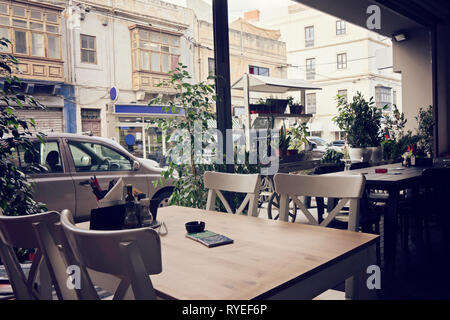 Modern interior of street restaurant cafe with open terrace Stock Photo