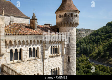 Stone walls of historic Basilica of St-Sauveur blend into the cliff in Rocamadour, France Stock Photo