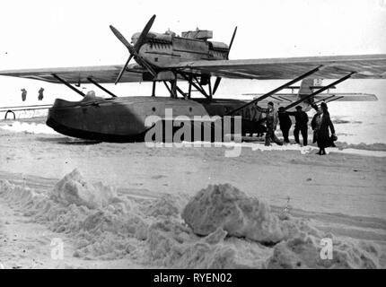 transport / transportation, aviation, seaplane, flying boat Dornier J Wal I, with the identification N25 North Pole expedition of Roald Amundsen 1925, with D-1422 transatlantic flight of Wolfgang von Gronau 1929 - 1930, from 1932 in the Deutsches Musuem in Munich, destroyed during an air raid 1944, after the landing at Oberwiesenfeld, Munich, 11.3.1932, Additional-Rights-Clearance-Info-Not-Available Stock Photo