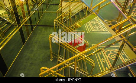 Green Carpeted Floor Inside The Stairways In The Cruise Ship With The Metal Railings On The Stairs And The Glass Walls Stock Photo Alamy