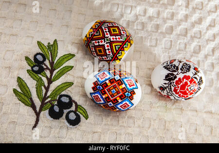 Painted Colorful Easter Eggs on Beige Huckaback Towel Stock Photo