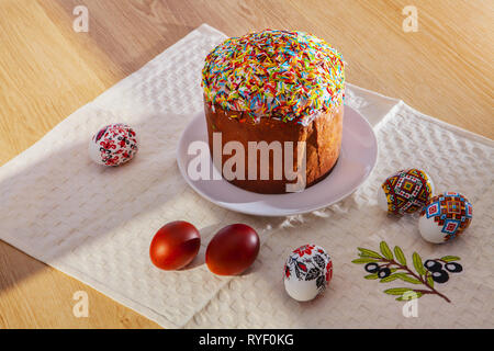 Painted Colorful Easter Eggs and egg bread Stock Photo