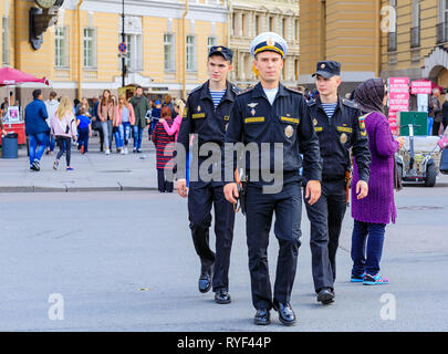 Saint Petersburg, Russia - September 10, 2017: Male Russian Navy cadets  dressed in uniform walking through Palace Square among tourists Stock Photo